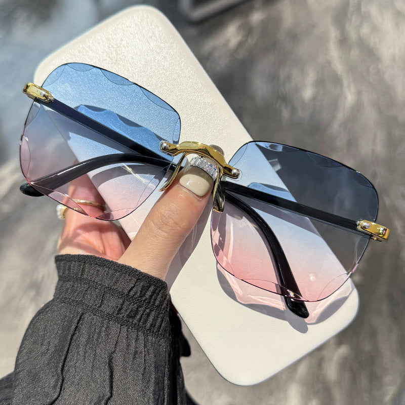Frameless border UV sunglasses
