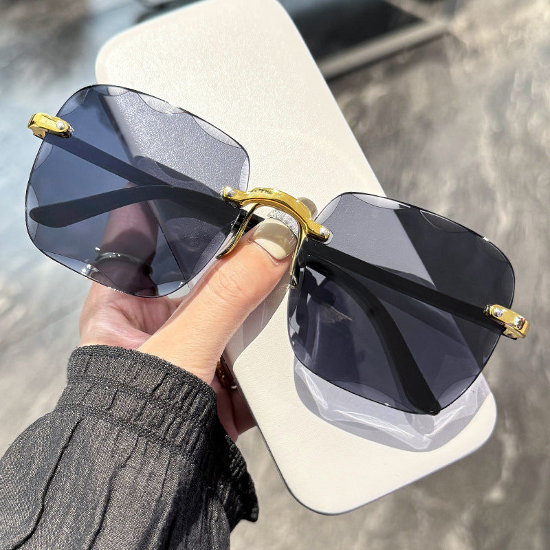 Frameless border UV sunglasses